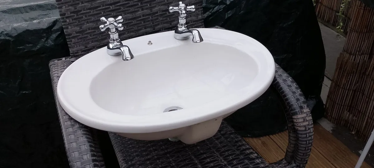 Bathroom sink with taps - Image 1