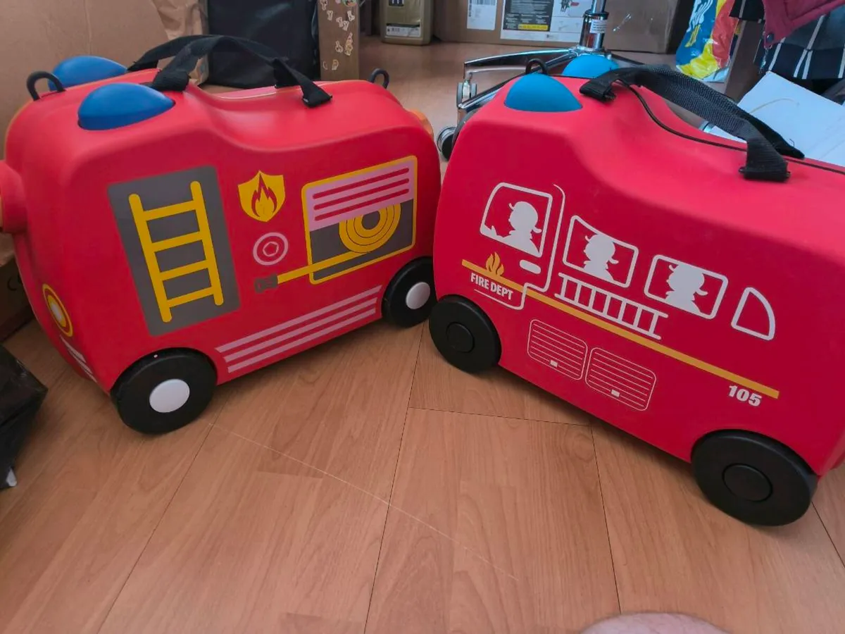 Kids ride on fire engine suitcase