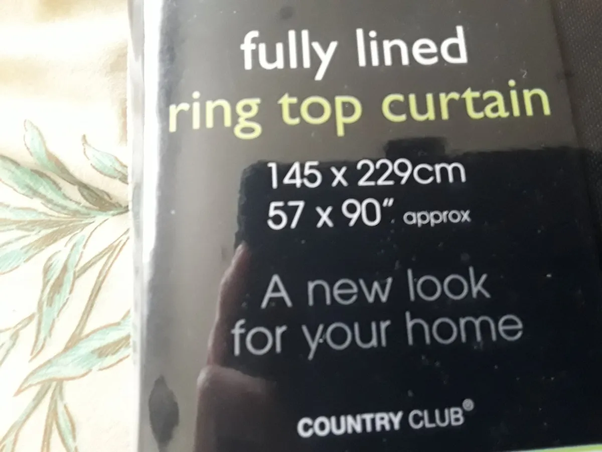 Brand new black eyelid drapes still in the packet