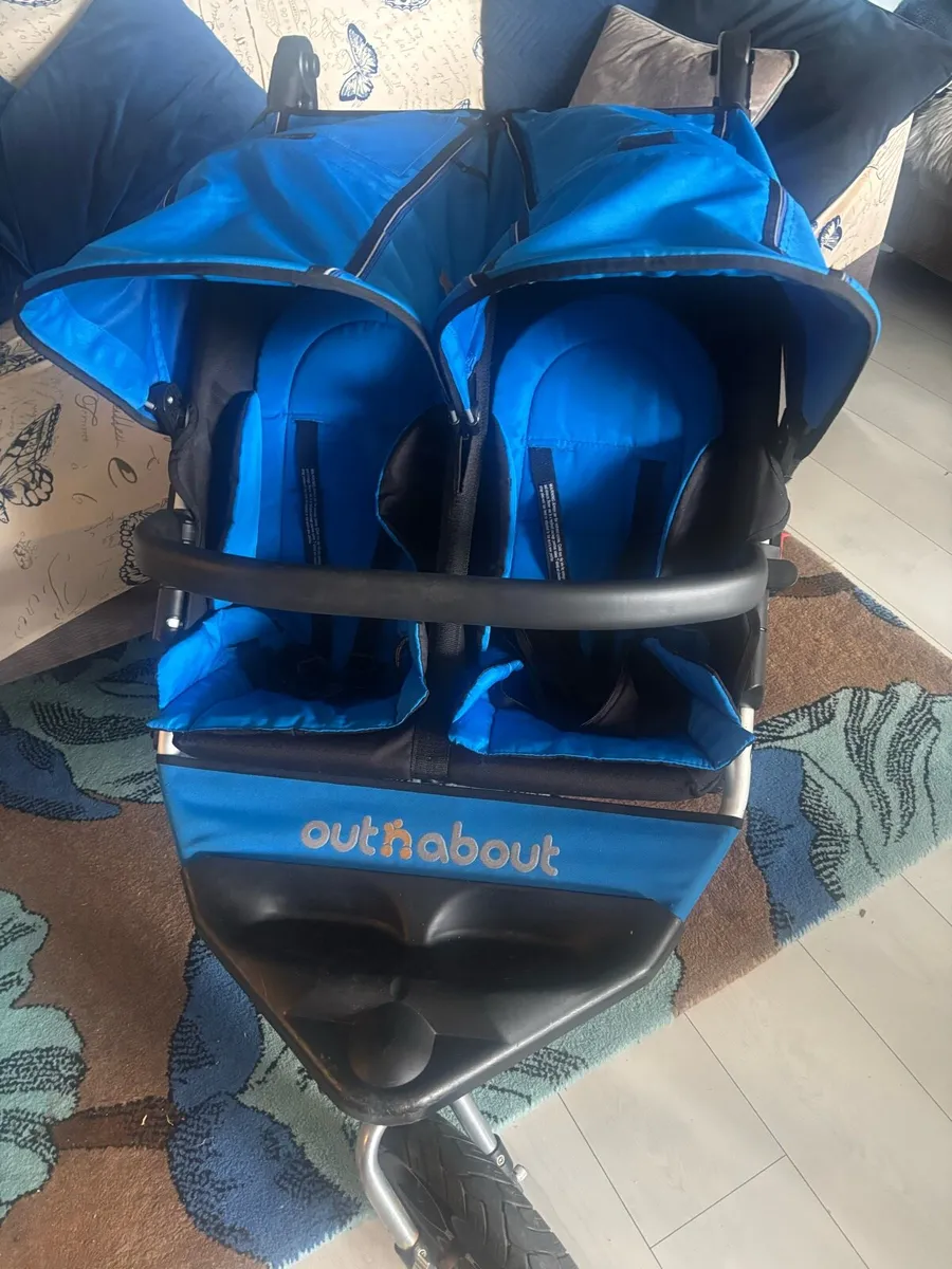 Out and about blue double nipper buggy - Image 1