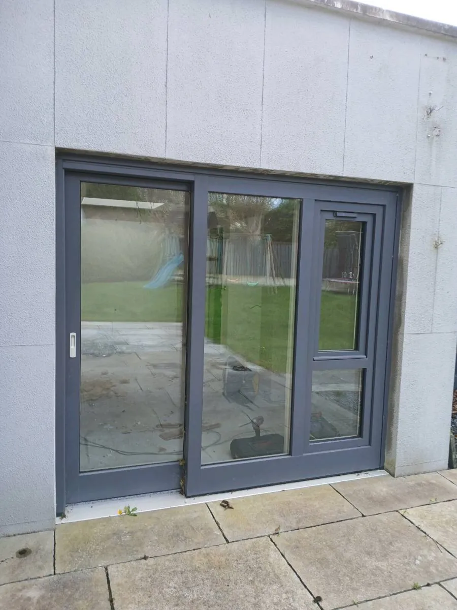 Grey patio door and winfow - Image 1