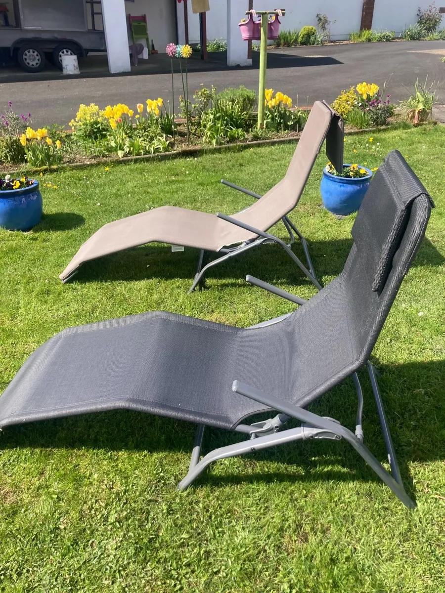 two sun loungers