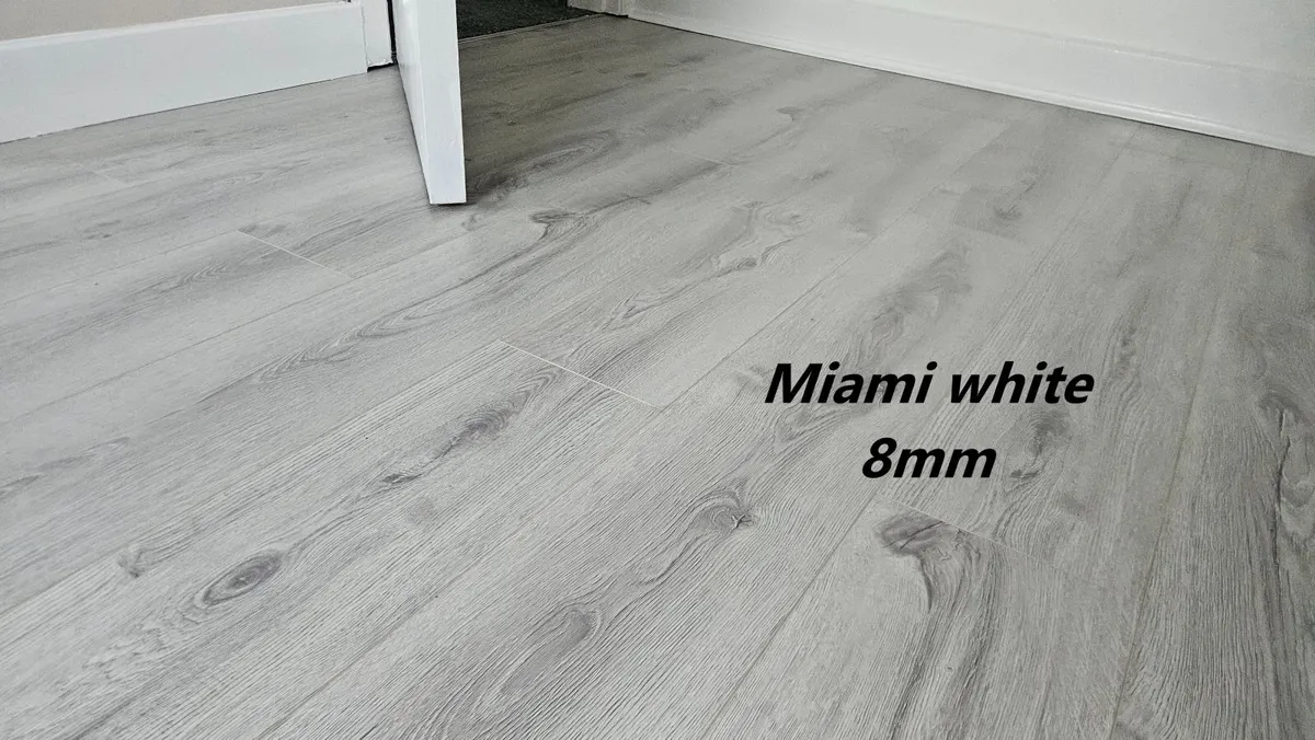 8mm laminated click flooring Delivered - Image 2