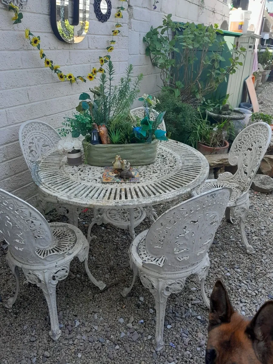 cast iron table and 5 chairs - Image 1