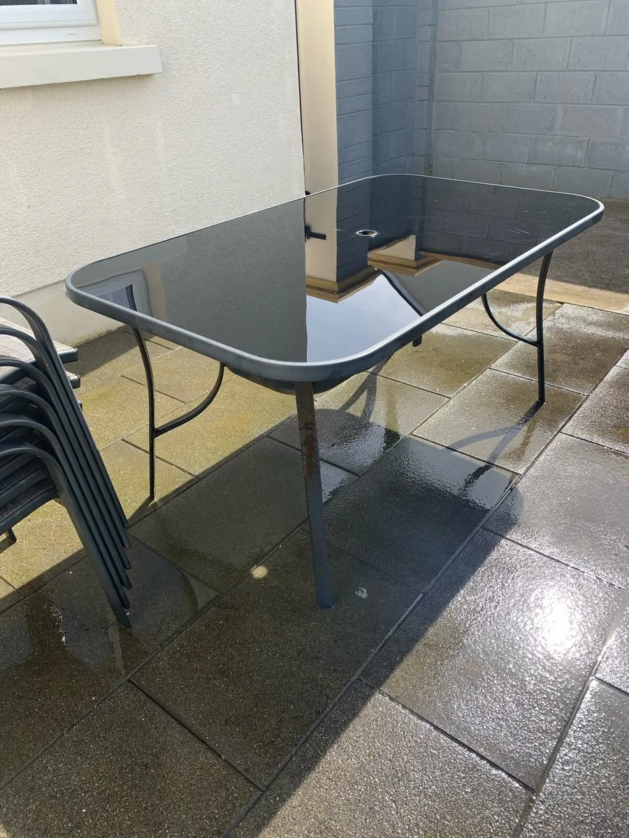 Patio table and chairs - Image 1