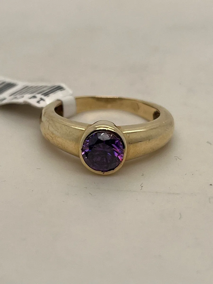 14k gold ring with purple stone. - Image 1