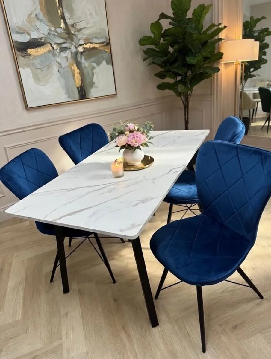 marble look dining table with chairs on special offer - Image 1