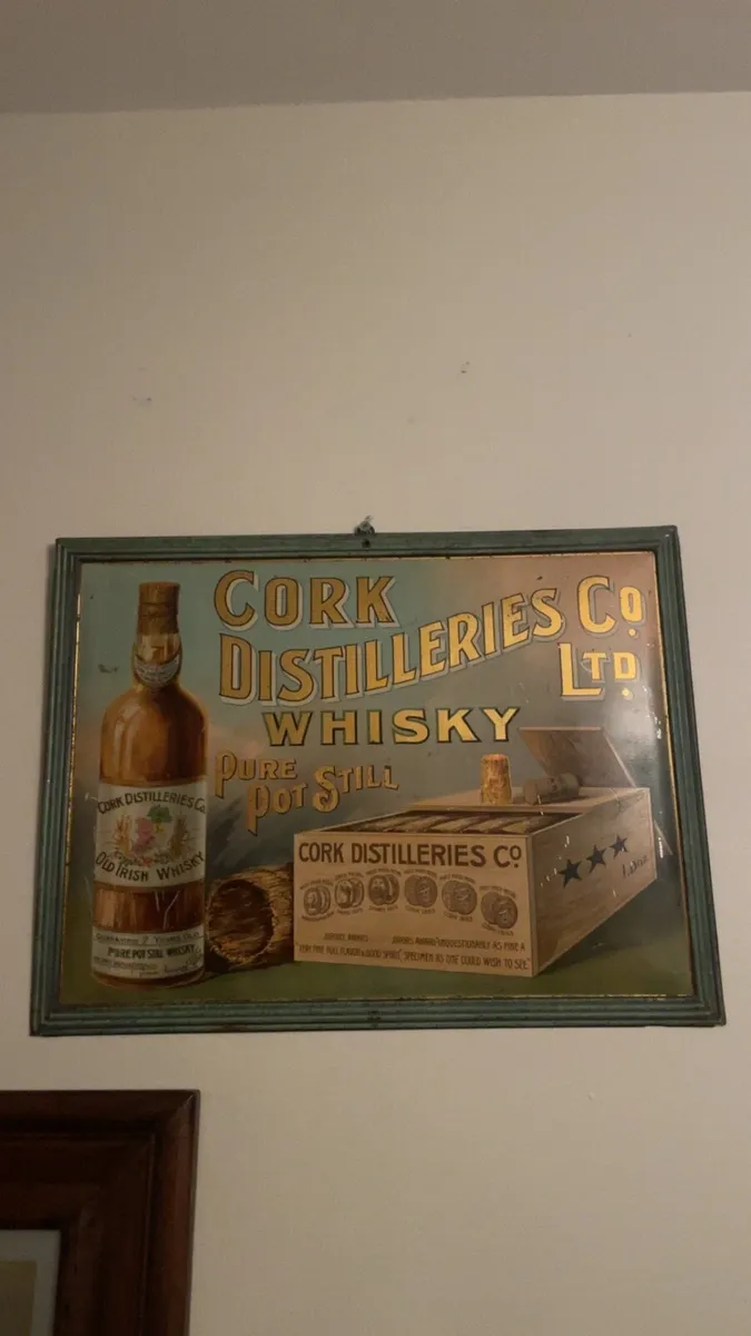 Vintage cork distilleries sign