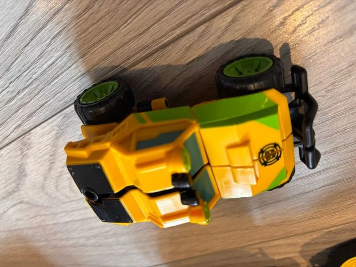 Mixture of toys godzilla, venom, dinosaurus, tracyor - Image 3