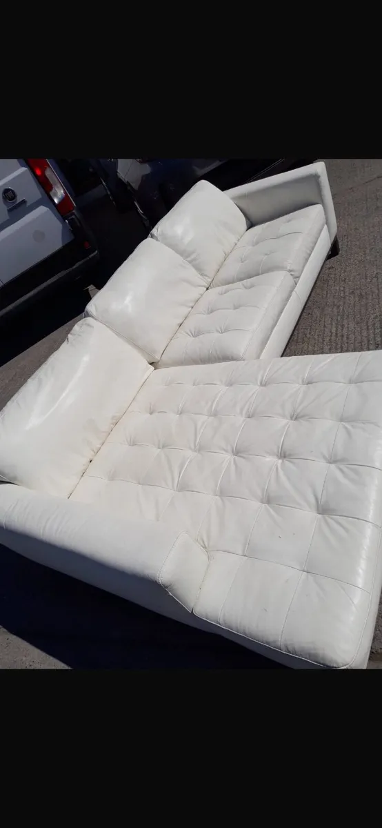L shaped cream leather Italian couch - Image 1