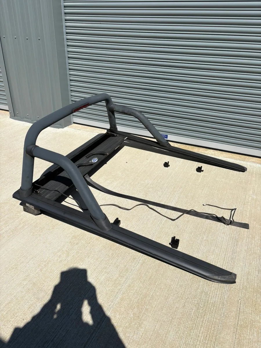Roll Top with Roll Bars Nissan Navara - Image 1