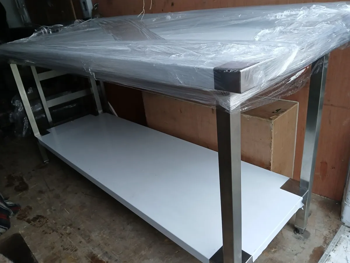 Staneless steel cabbinet  table on wheels del - Image 1