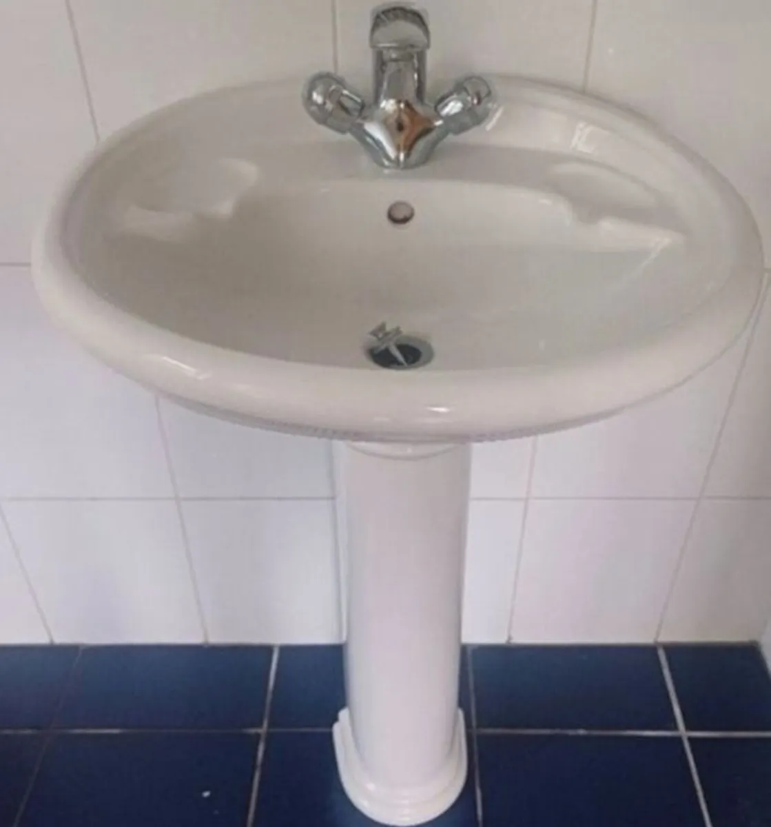 Bathroom pedestal sink and taps