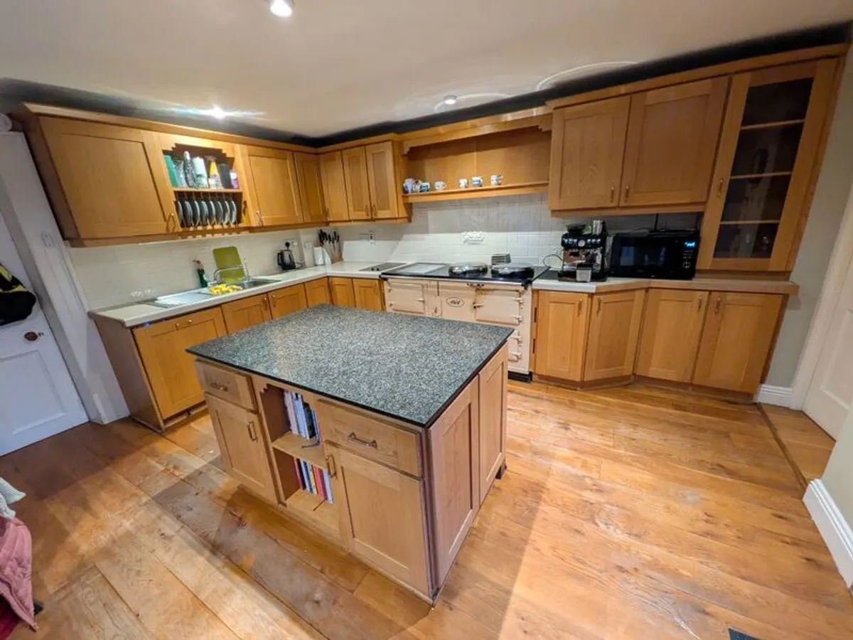 Solid wood kitchen with granite island - Image 1