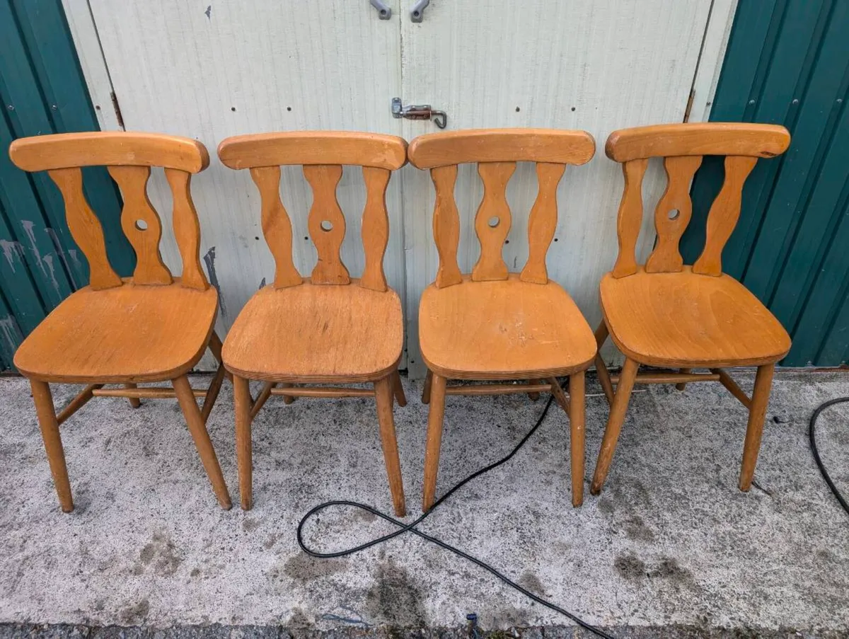 Four kitchen pine chairs.