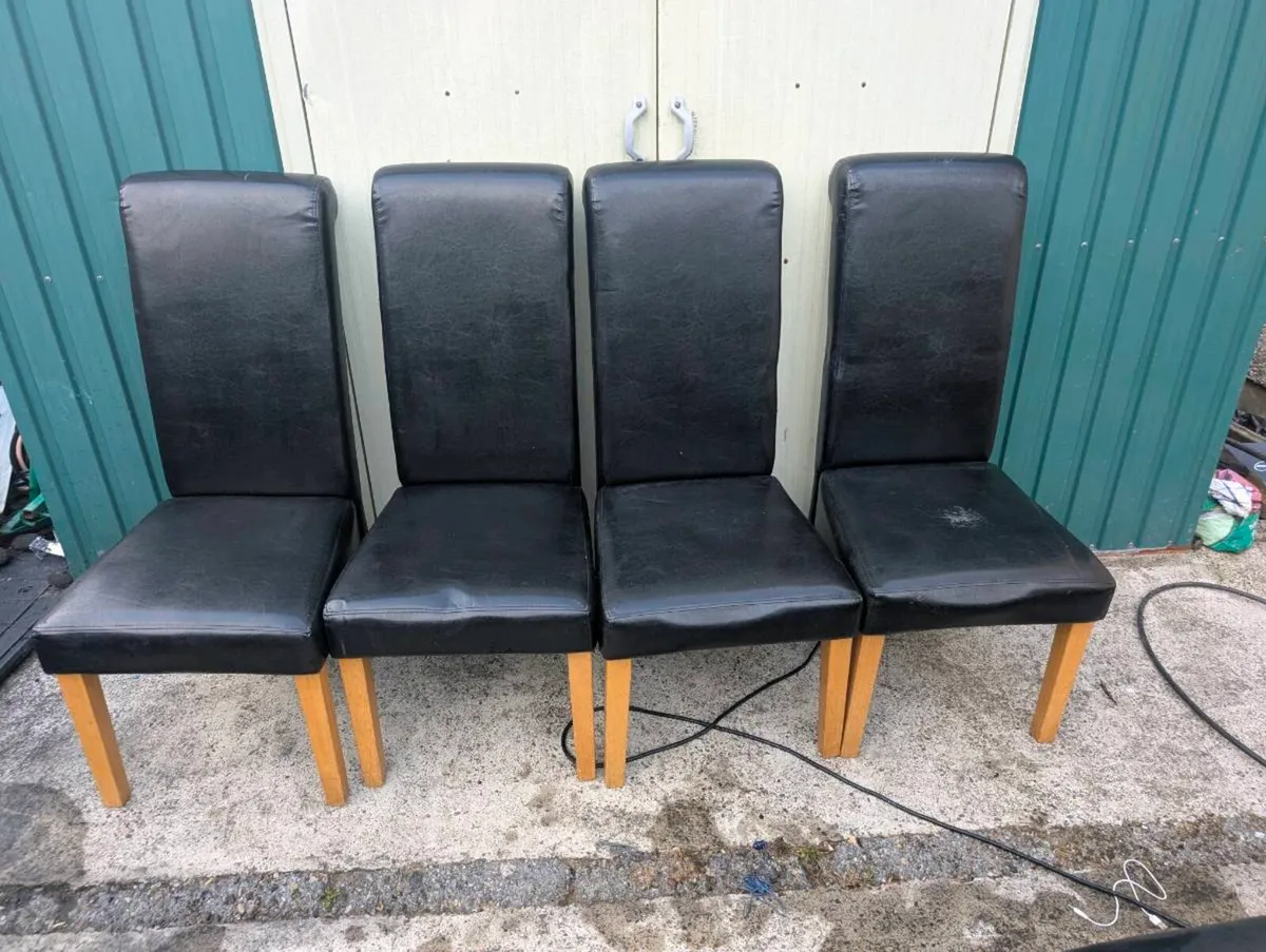 4 black leather  dining room chairs - Image 1