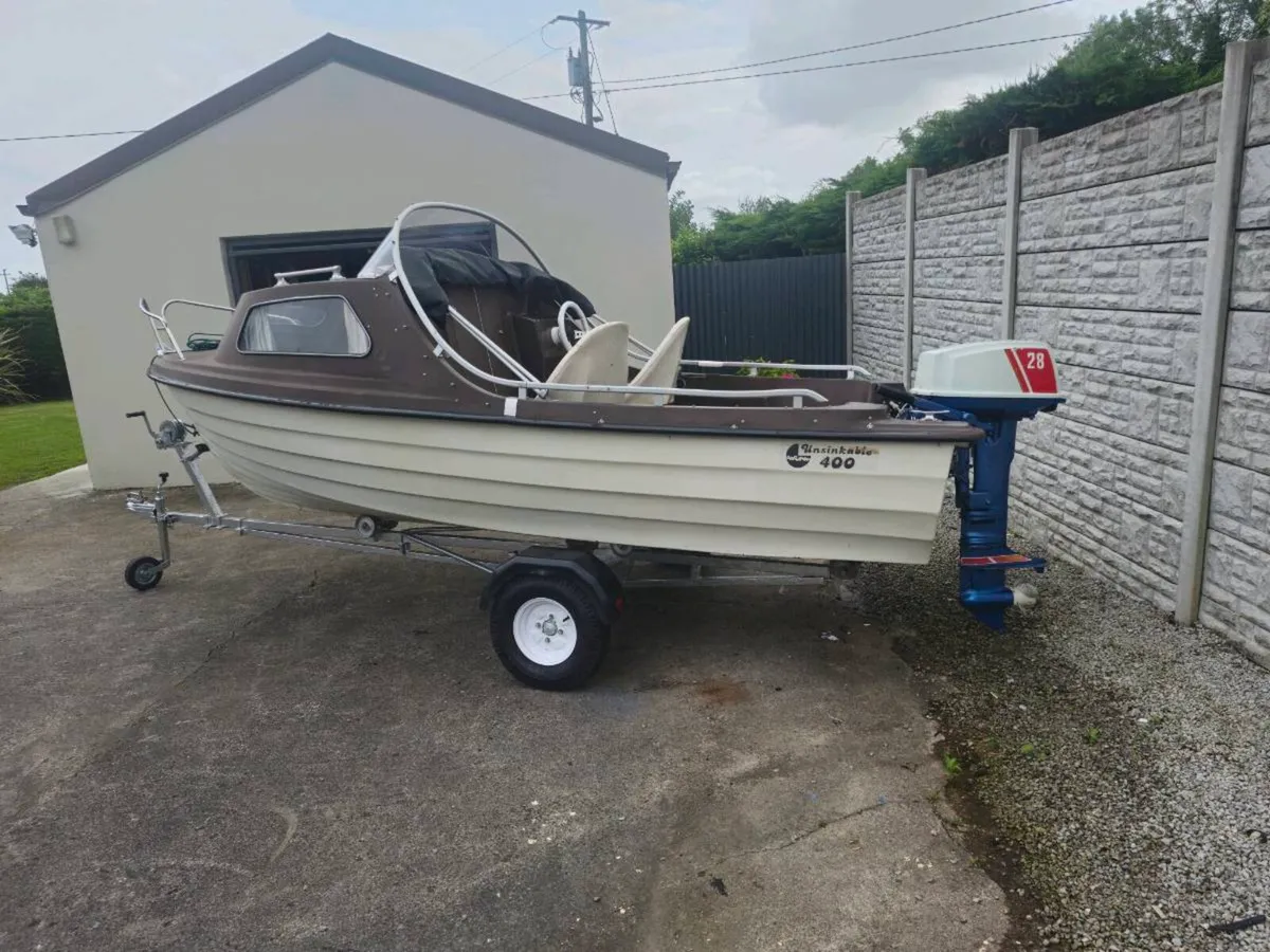 Boat and trailer and two engines for sale - Image 1