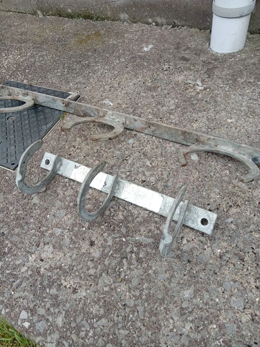 Implement rack,  rope hooks