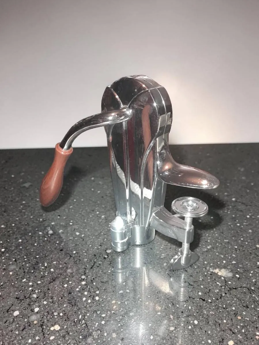 Vintage silver chrome bar top bottle opener