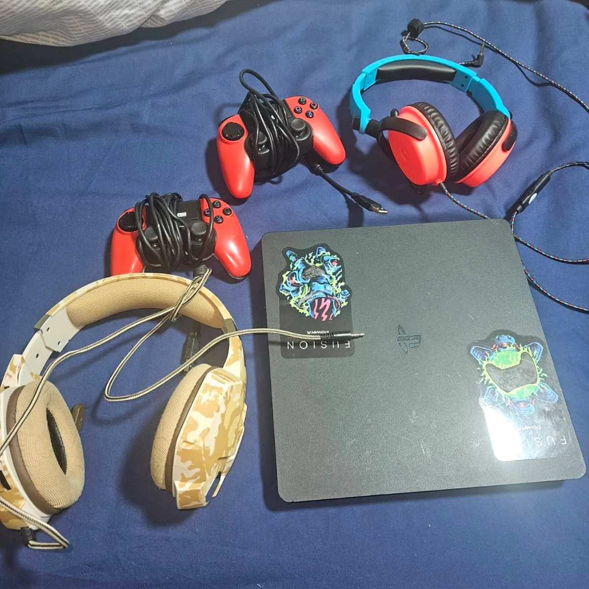 Playstation 4 with 2 controllers and 2 headsets - Image 1