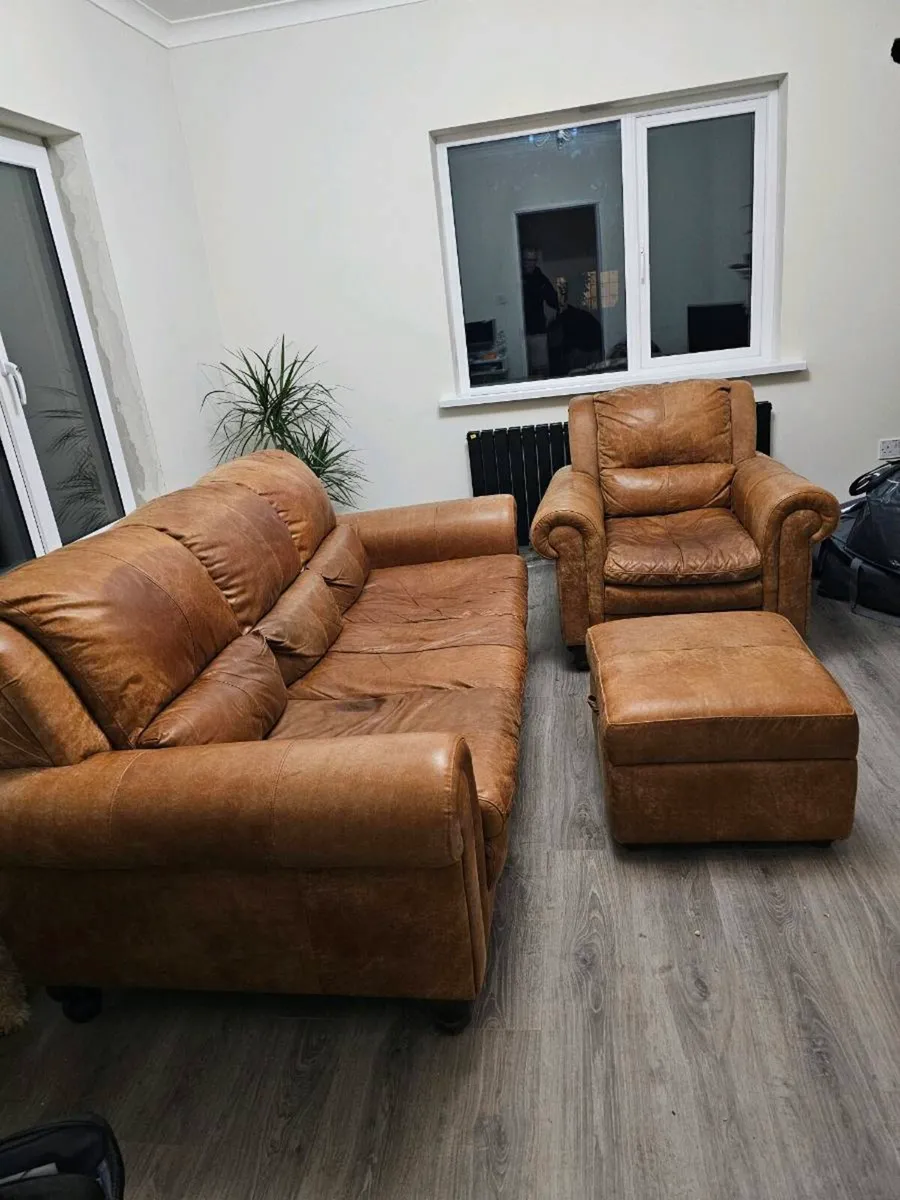 Tan Leather sofa   chair and Poofee. - Image 1