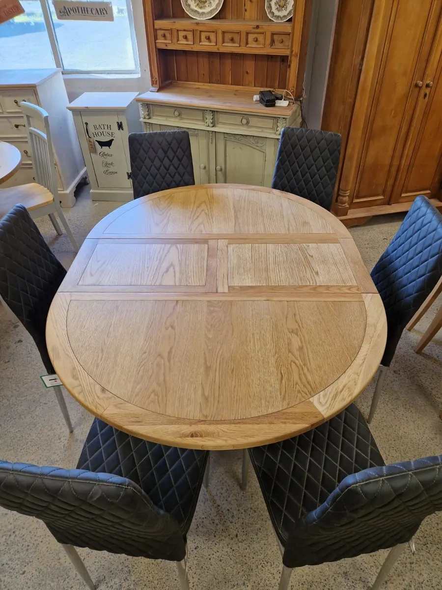 6 ex display leather chairs extendable oak table - Image 3