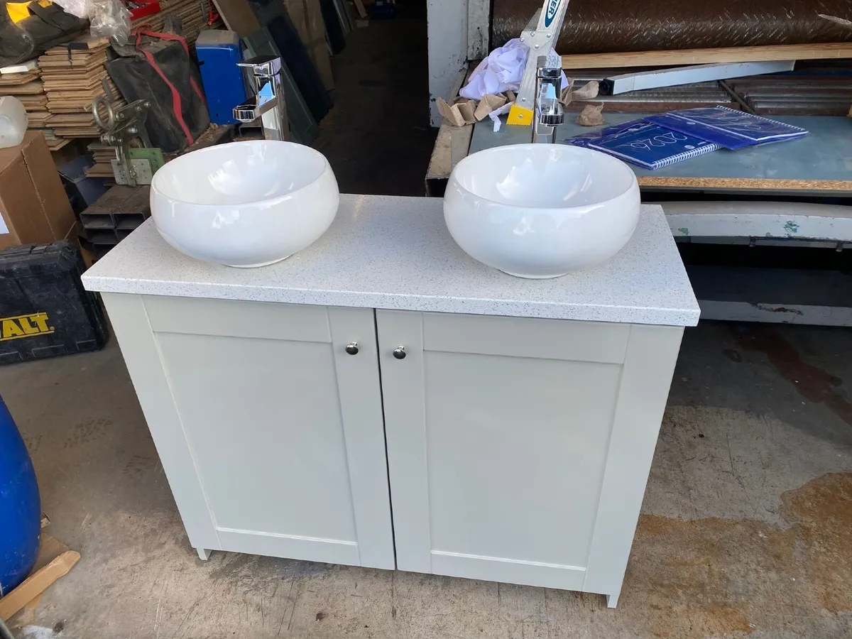 Cream vanity unit Sinks and taps included