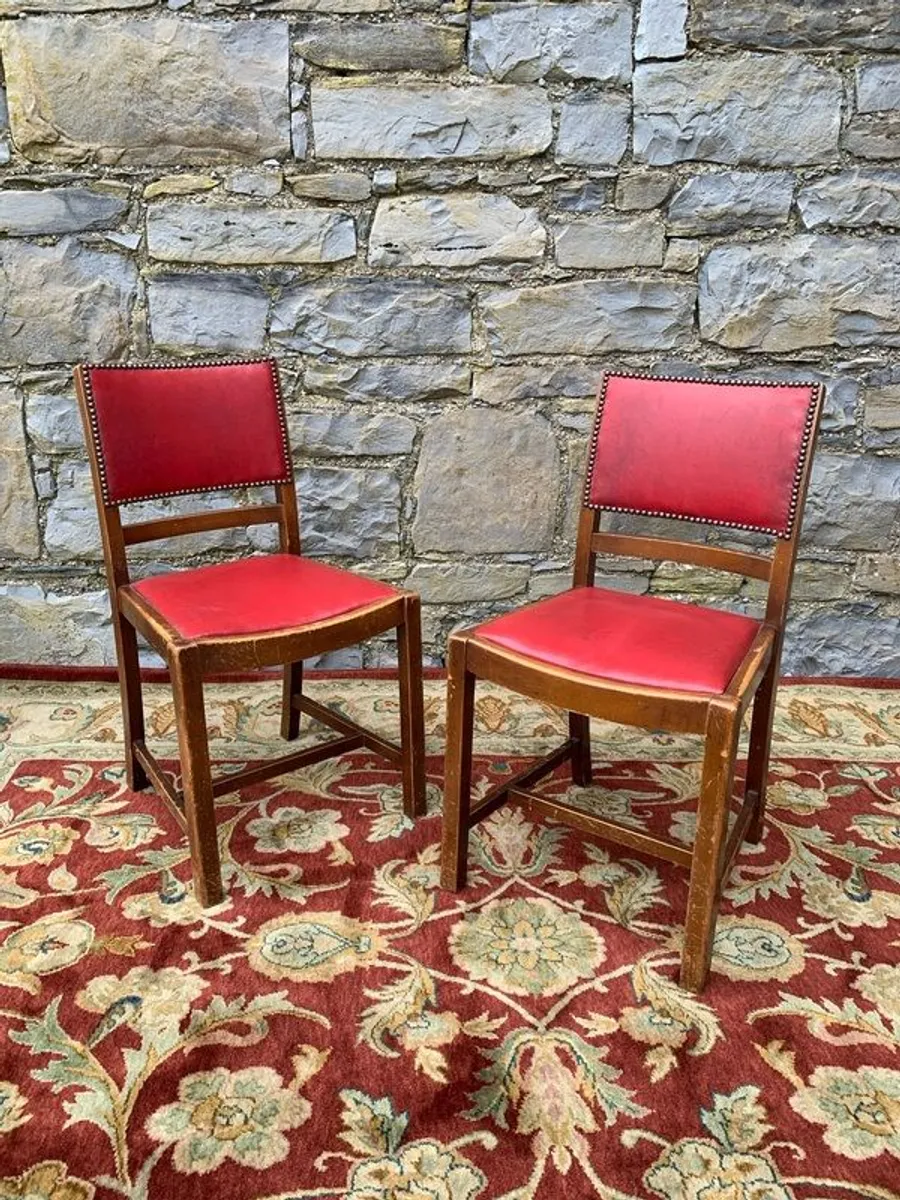A pair of mid century leatherette kitchen chairs. - Image 1