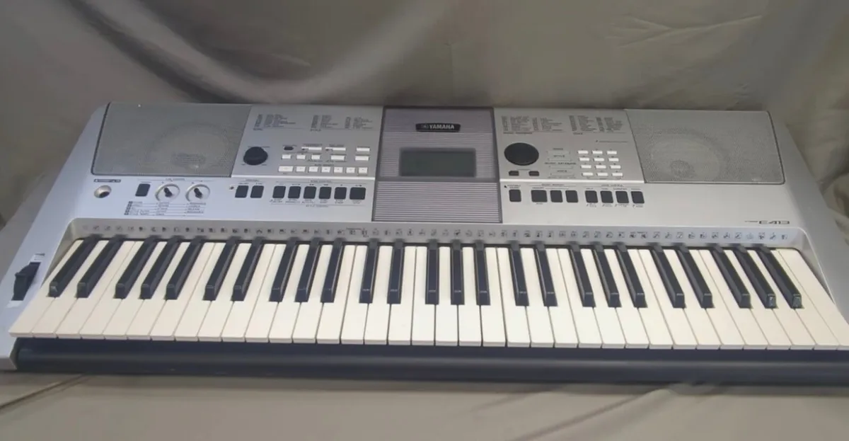 Yamaha Piano Keyboard and Stand