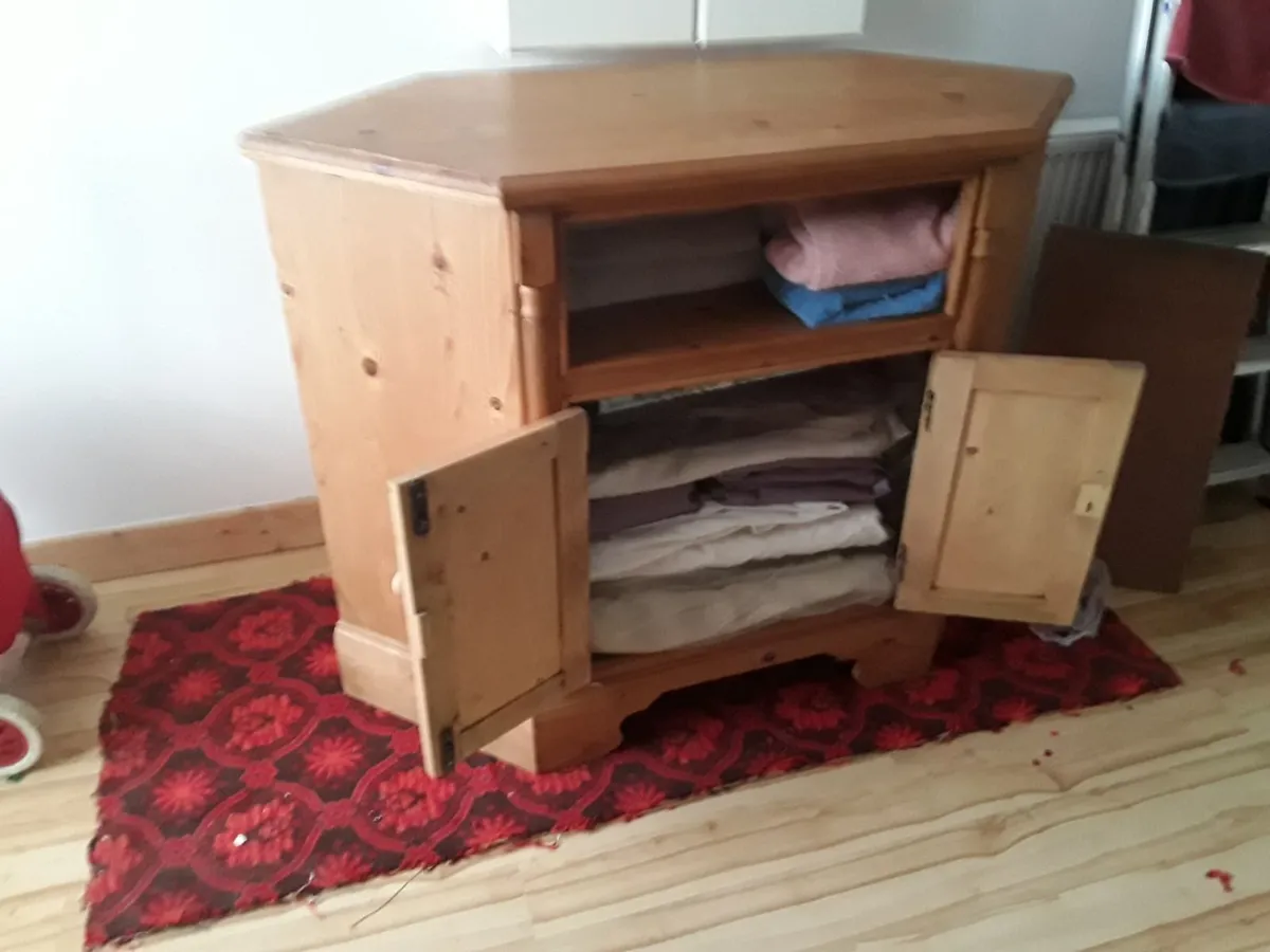Large solid wooden unit with plenty of storage - Image 1