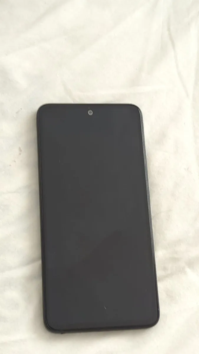 Xiaomi Redmi Note 14 4G with two cases from amazon - Image 1