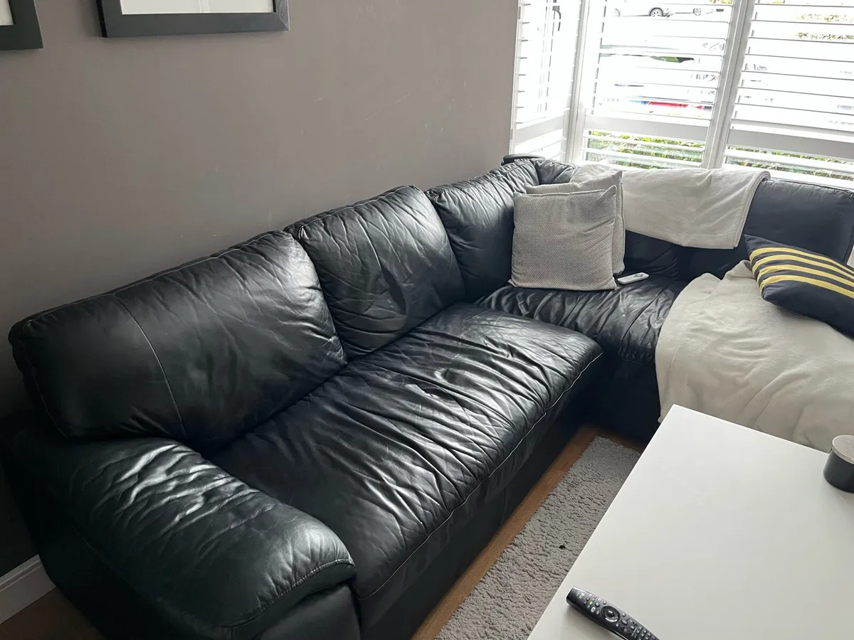 Leather corner sofa & swivel chair. Free. - Image 1