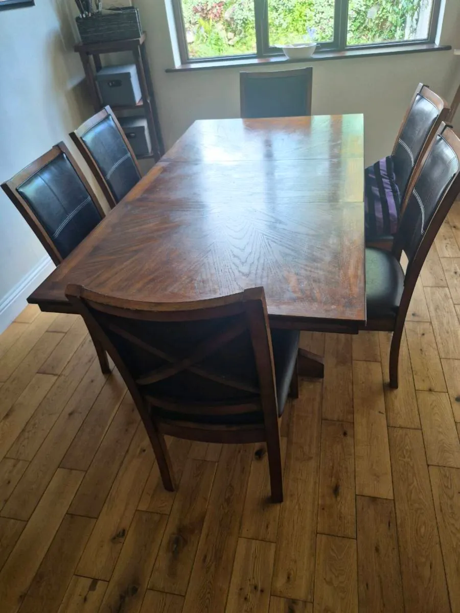 Dining table and 8 chairs - Image 1
