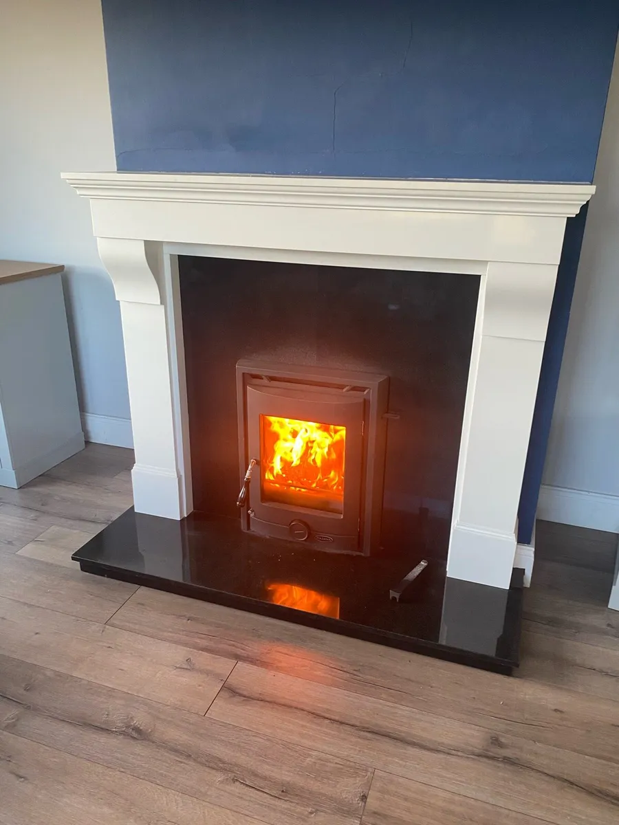 Marble fireplace with insert stove - Image 1