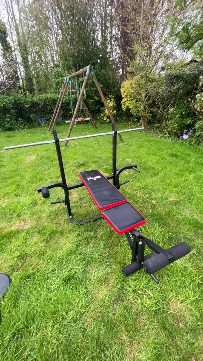 Multi use gym machine with weights and accessories - Image 1