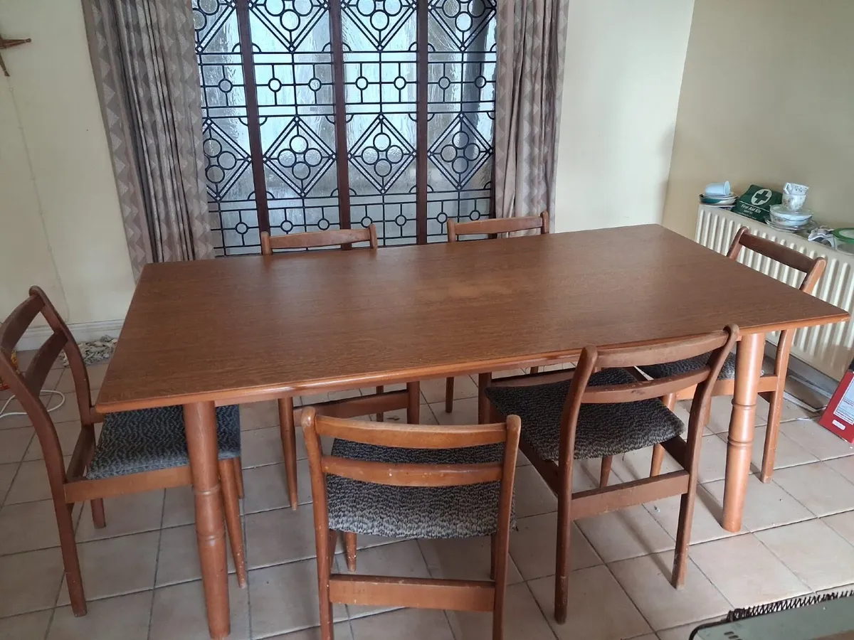 kitchen/dining room table and  six chairs