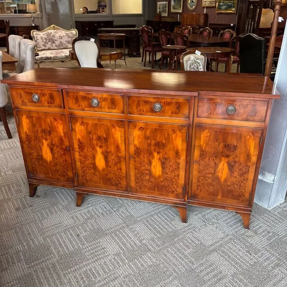 Fabulous flamed break fronted sideboard. Enclosed