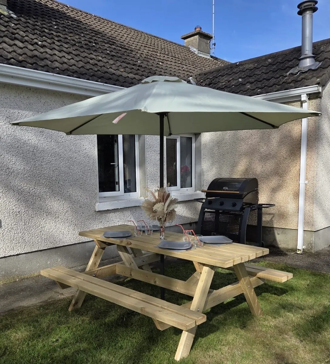 Picnic bench with parasol
