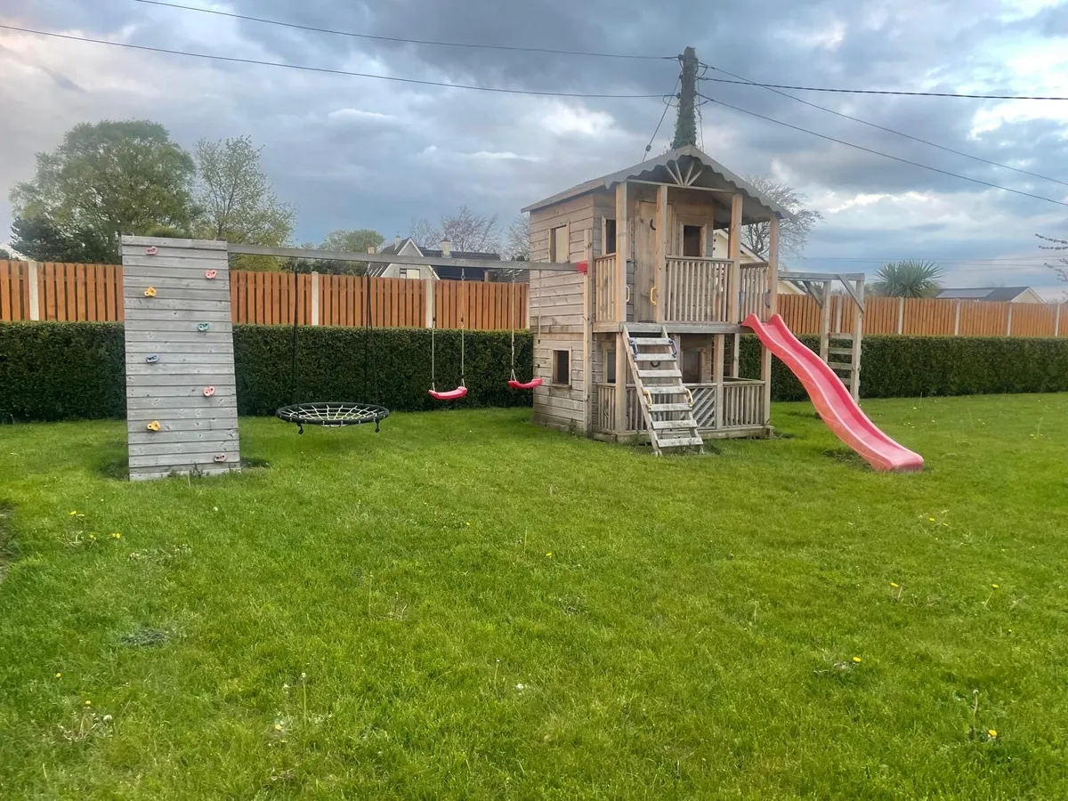 Large kids treehouse with play centre.