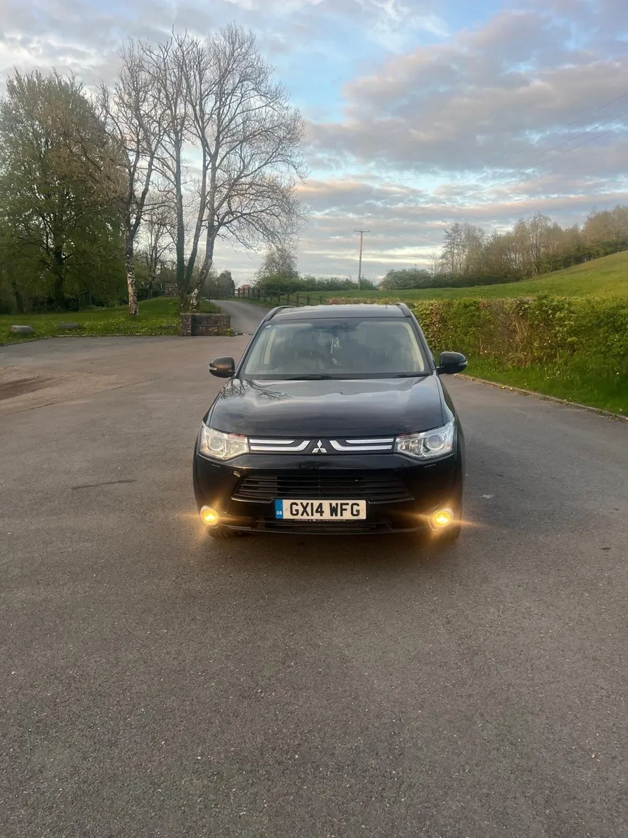 2014 Mitsubishi - Image 1