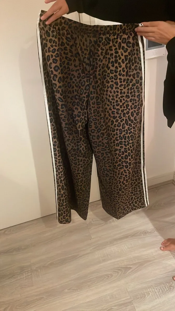 Leopard print adidas tracksuit bottoms - Image 1