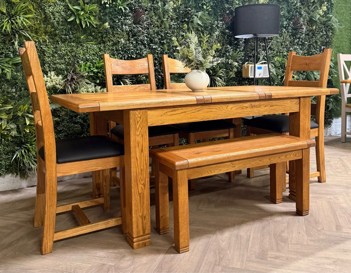 Extending oak kitchen table, 4 chairs & bench - Image 1