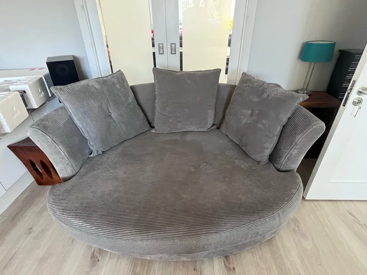 Grey cuddler sofa - Image 1