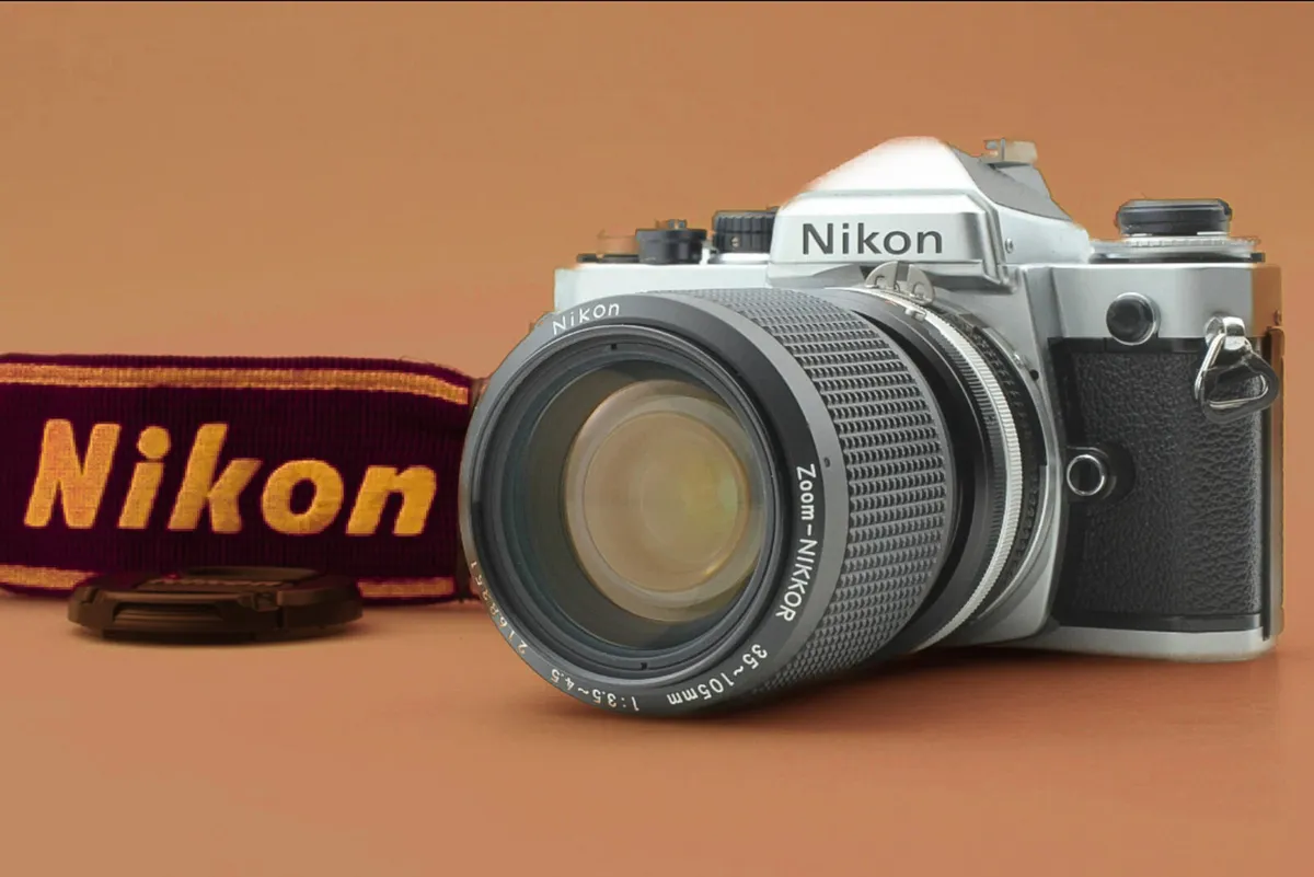 Nikon FE 35mm Film Camera + 35–105mm Zoom Lens (Ve - Image 1