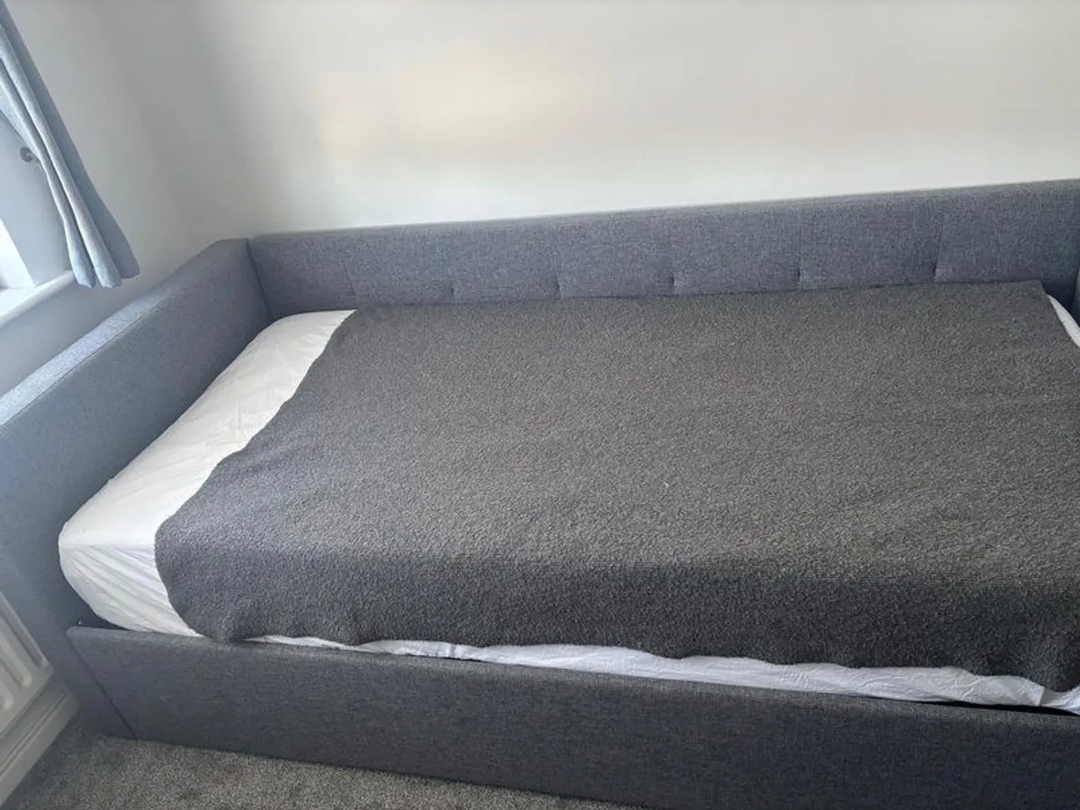 Grey Upholstered Daybed with Trundle and Mattresses - Image 1