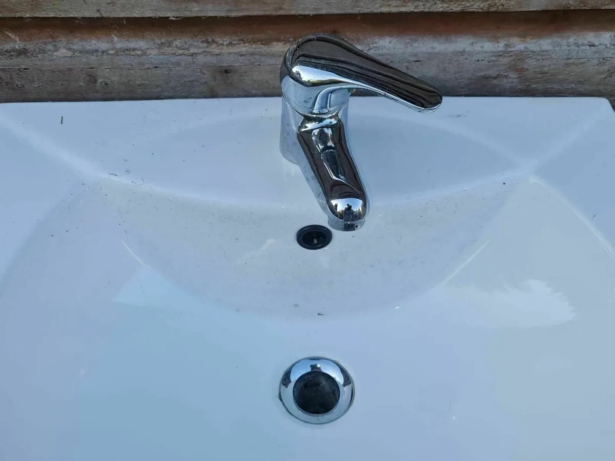 A wash basin with mixer tap - Image 2