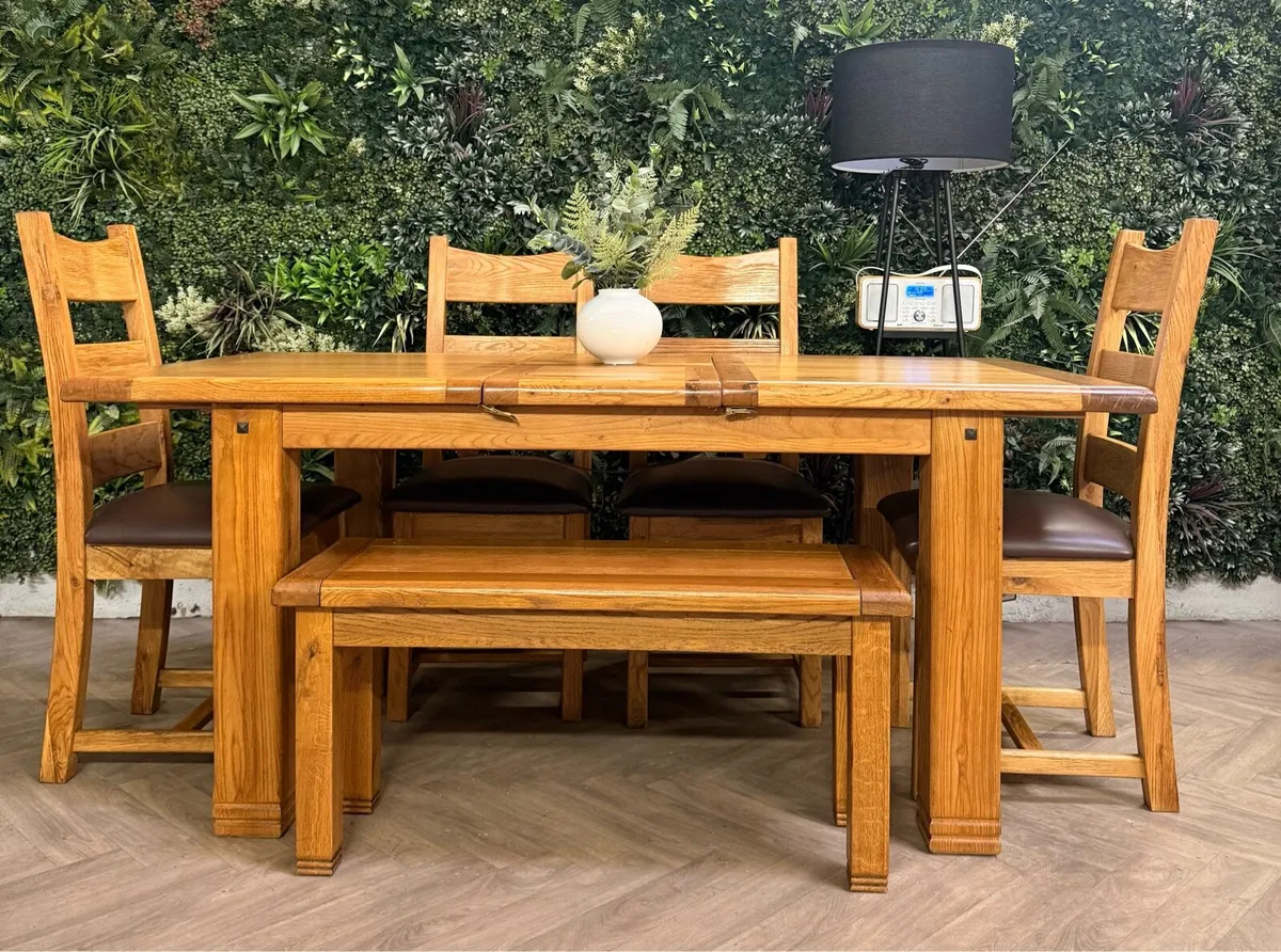 Extending oak kitchen table, 4 chairs & bench - Image 1