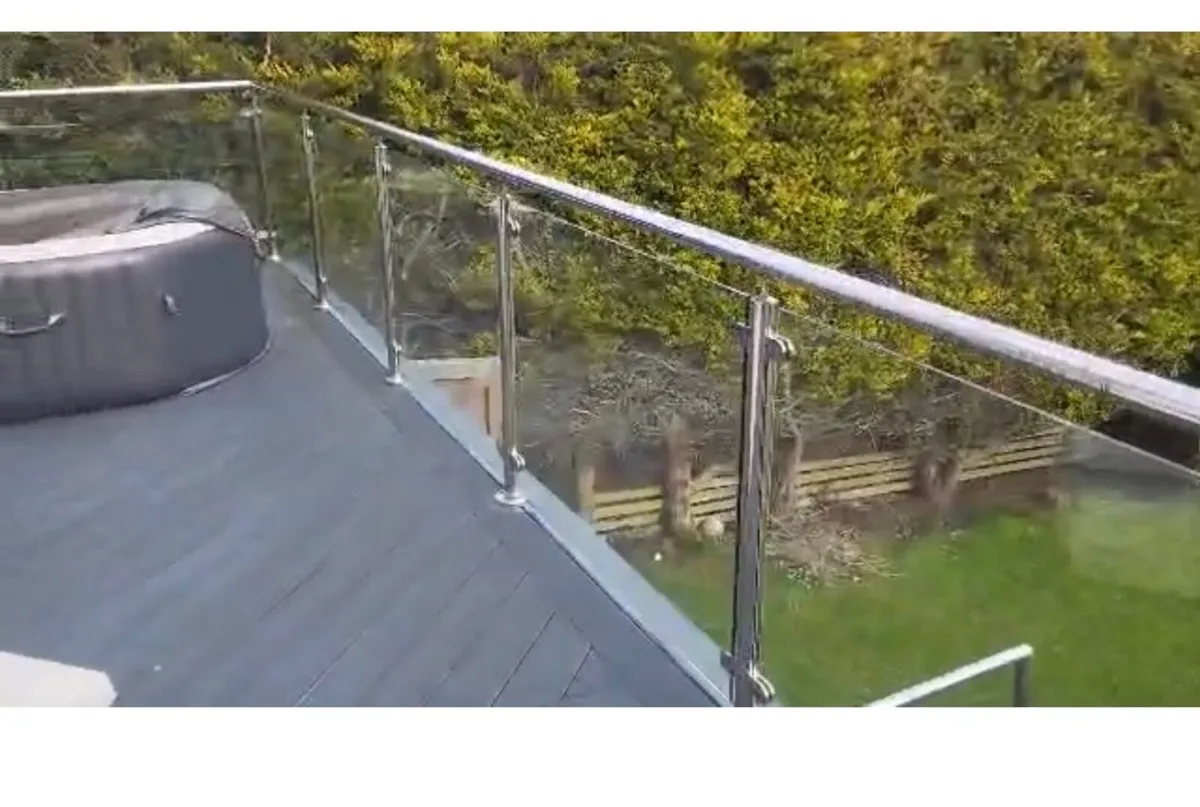 Balcony glass panels and stainless steel posts - Image 1