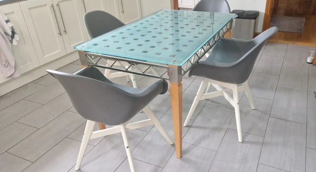 Italian glass table and 4 chairs (can sell seperately)