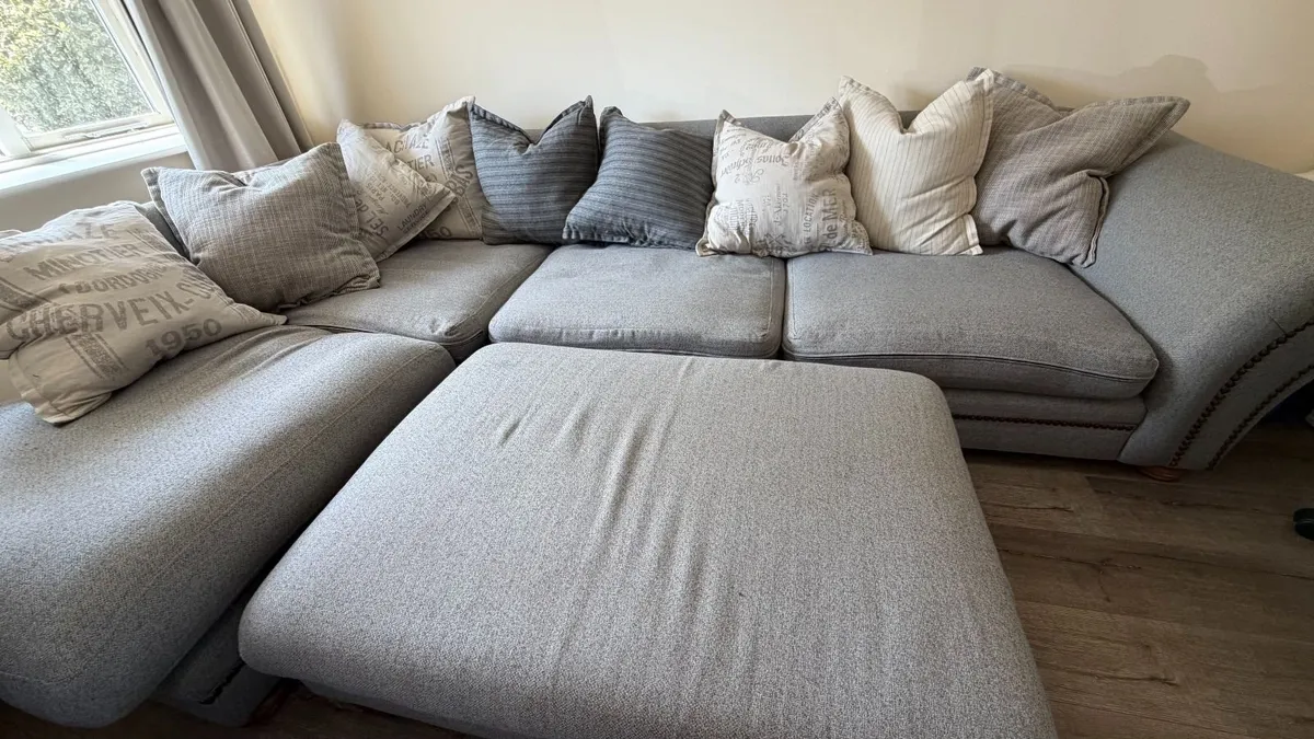 Spacious Grey Sectional Sofa with Ottoman